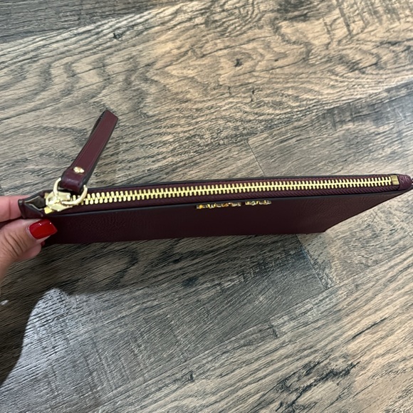 Michael Kors Jet Set Travel Large Perforated Wristlet in Dark Plum Wine - Picture 3 of 6